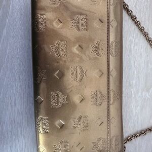 MCM Gold Embossed Clutch